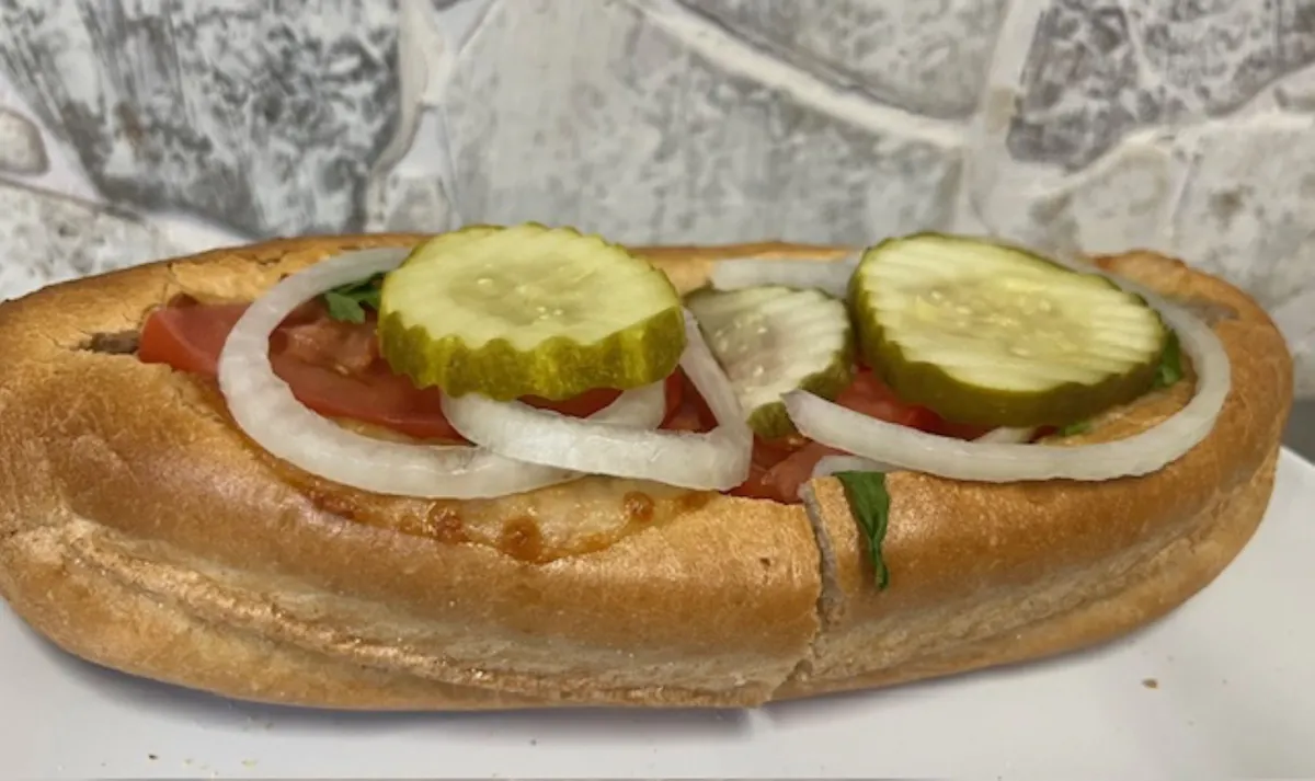 a sandwich sitting on top of a bun